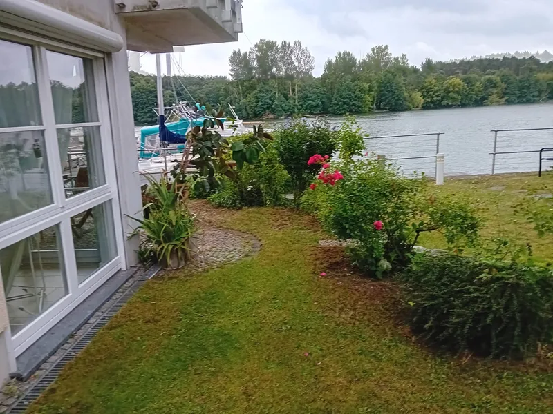 Traumhafte 2-Zimmerwohnung mit eigenem Garten direkt an der Müggelspree – Urlaubsfeeling pur — photo 1